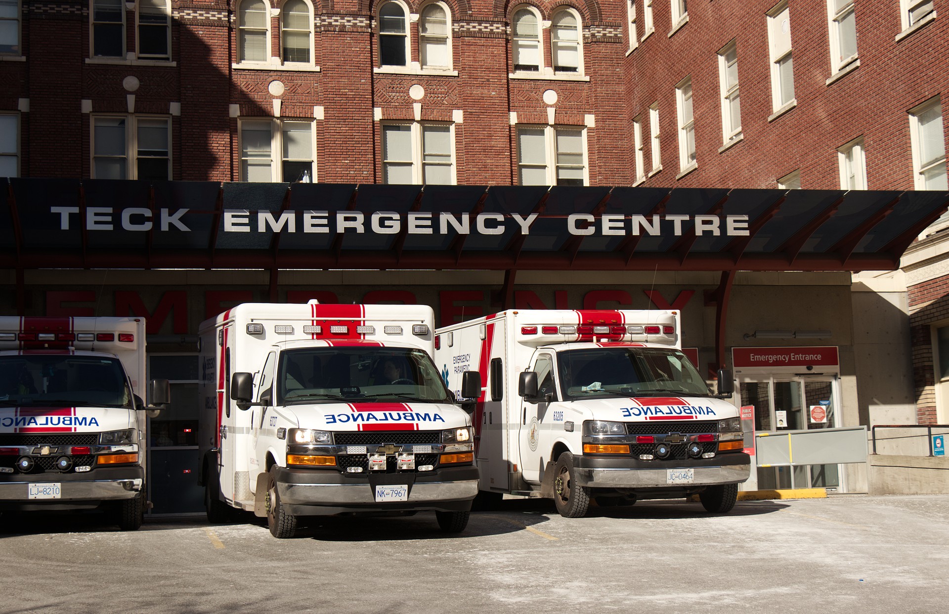 View of Emergency Department "Teck Emergency Centre" at St Paul Hospital with ambulance vehicles near the entrance